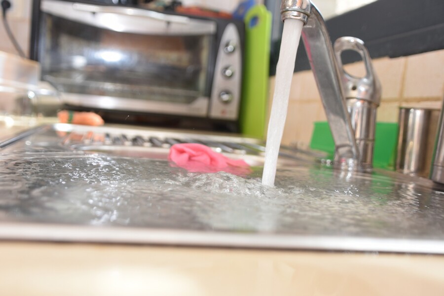 Sink overflowing due to clogged drain ... call Lifetime Plumbing & Drains Inc for drain cleaning.